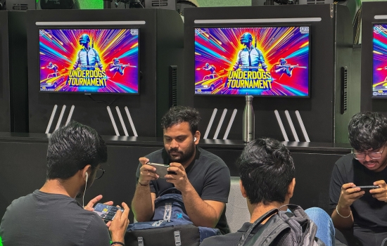 Students sit in the Nexus and play PUBG on their phones