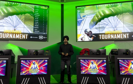 Pratham standing on the Nexus stage waiting for the event to start