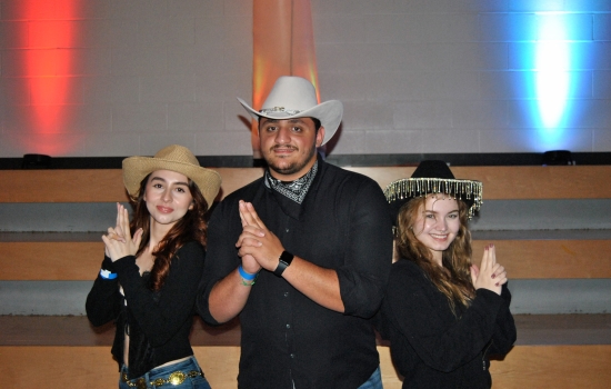 3 SRD Board members dressed as cowboys