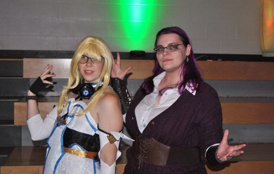 2 students in costume in the SLC