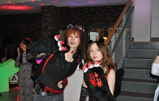 2 students in costume in the SLC