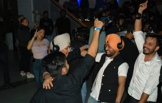 Students dancing together and smiling
