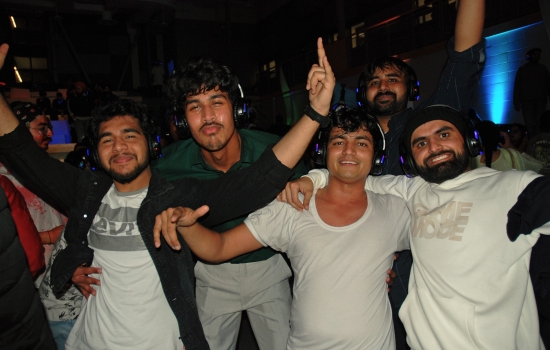 A group of students posing for a photo on the dance floor