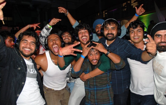 A group of students posing for a photo on the dance floor