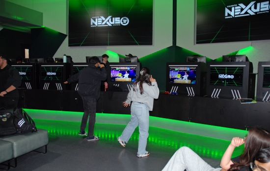 2 students playing Just Dance in the Nexus