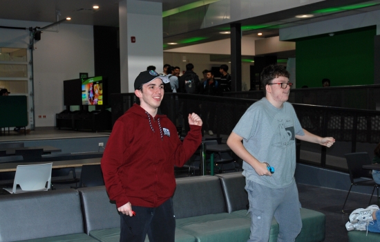2 students playing Just Dance in the Nexus