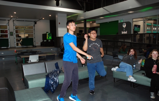 2 students playing Just Dance in the Nexus