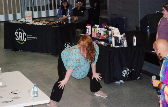 A student participates in a twerking contest