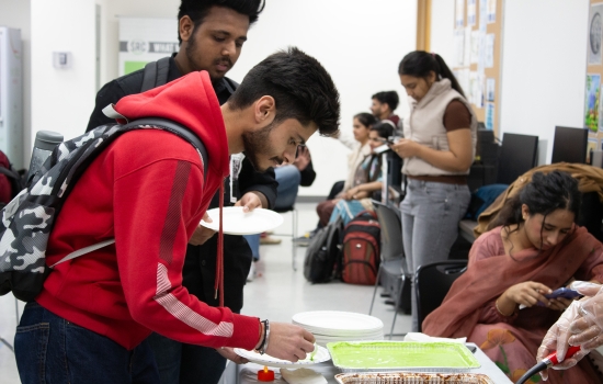 A student spoons himself out some chutney
