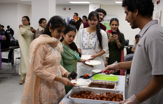 Students in line being served snacks