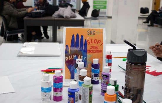 Tablescape with paint and signage at the event