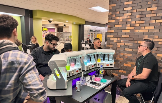 Students gather around the oxygen bar for their dose of aromatherapy and concentrated oxygen