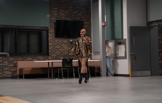 Bald drag queen, Sabin, makes a grand entrance into the SLC in super high stillettos
