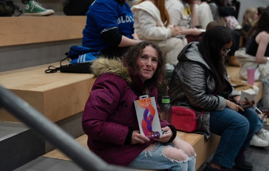 A winner shows off their sexy prize