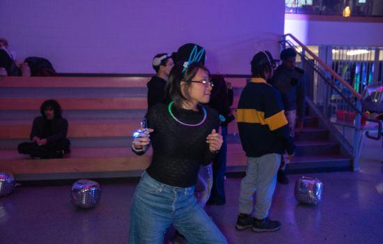 A student dances in the SLC