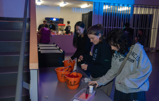 Students help themselves to the candy bar