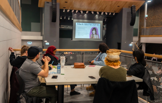 A table of students attending the event
