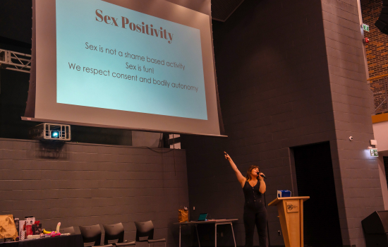 Sabrina talks to the crowd about sex positivity
