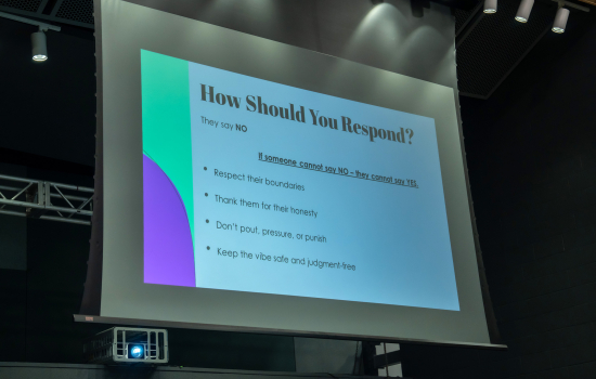 A slide on the projector about consent