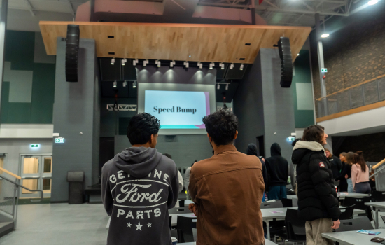 Two students learning about positions