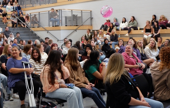 SRC & SSAA play an interactive beach ball trivia game with the crowd of new students 