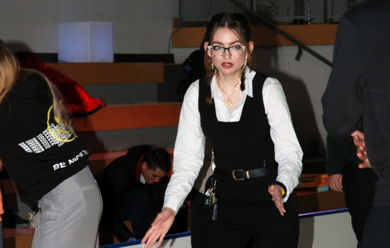 A student skates around the SLC