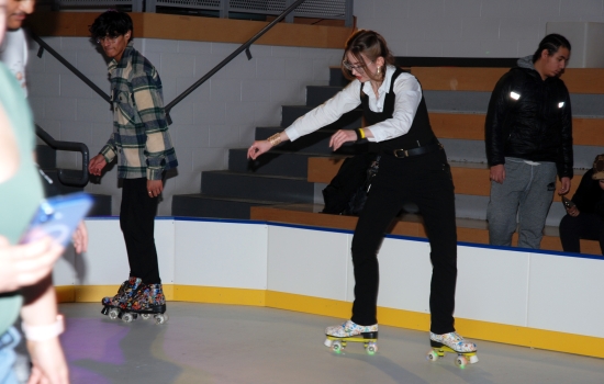A student skates around the SLC