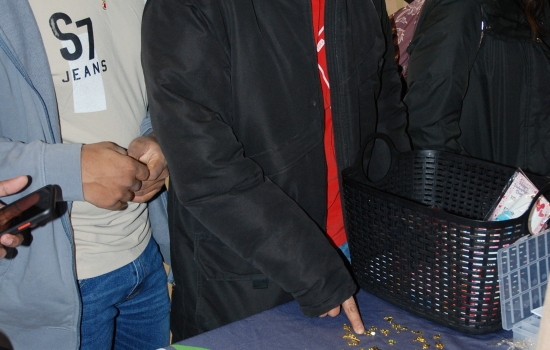 Students look at the various charms
