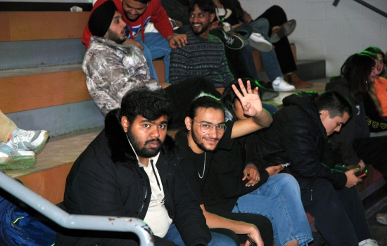 Students take a break in the tiered seating of the SLC