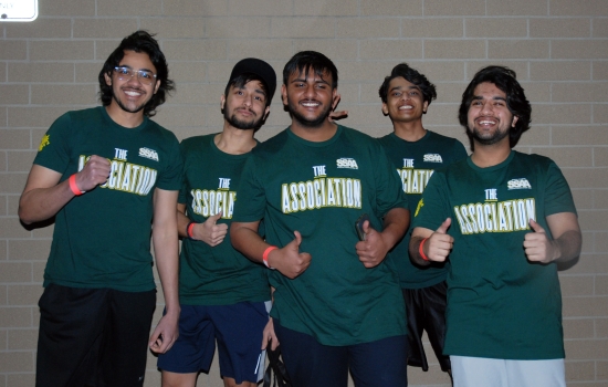 A group giving thumbs up in SSAA shirts