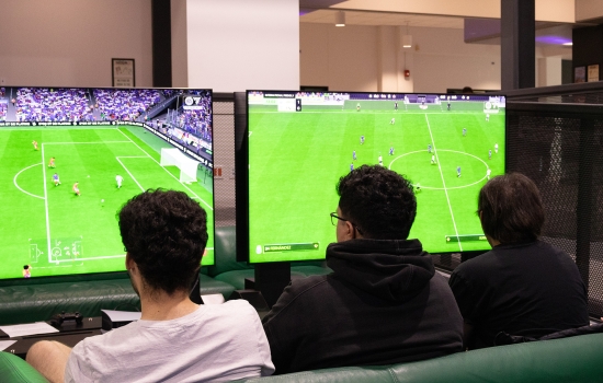 Students play FIFA in the Nexus