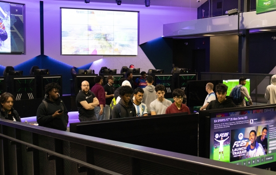 A crowd is gathered for the event in the Esports Nexus
