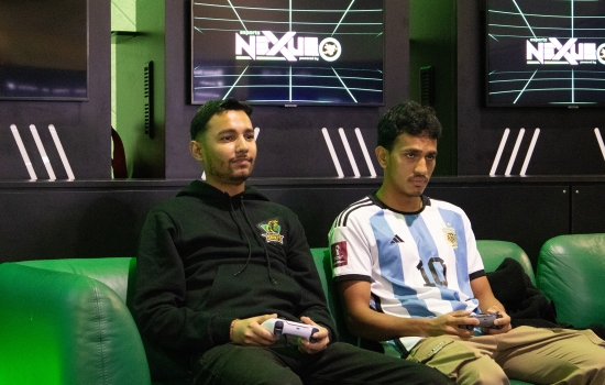 Students play FIFA in the Nexus