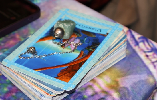 A stack of tarot cards on the table