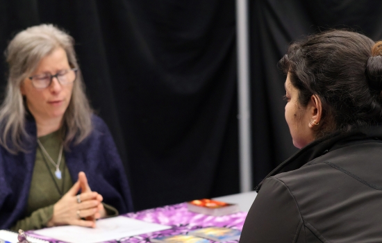 A medium explaining the reading to a student