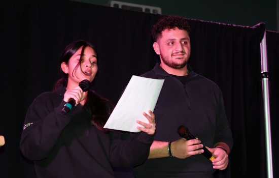 MCs Harnoor and Ali take the stage between sets to announce the next act