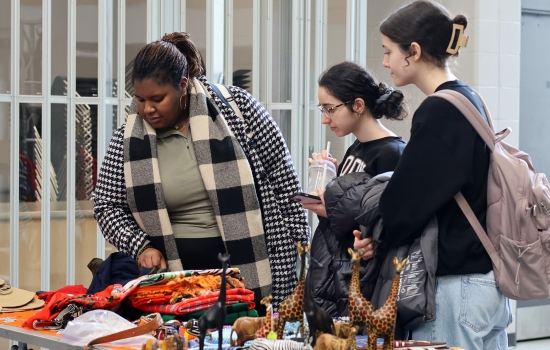 Students checking out the wares at a booth