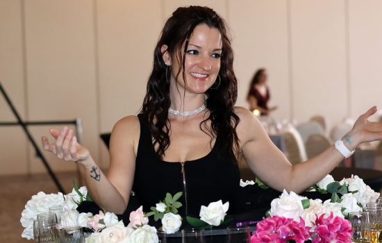 Event staff wearing a sparkling cider dress
