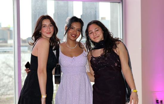 Three friends pose for the camera