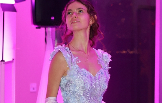 A guest shows off their gown
