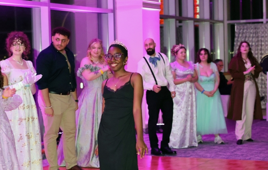 A guest shows off their gown
