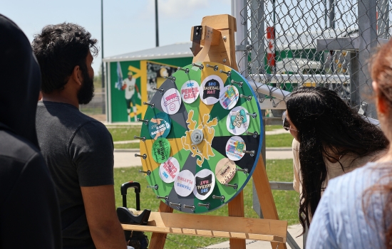 A student spins our prize wheel