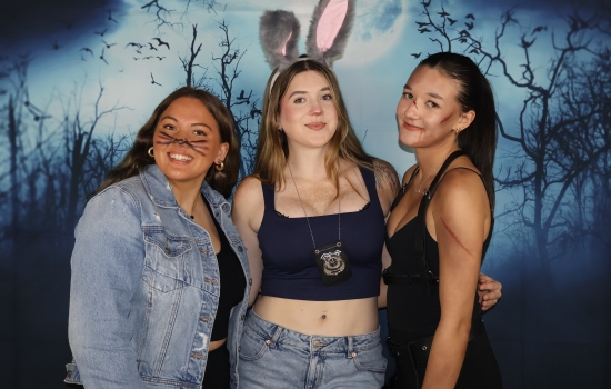 3 students in costume