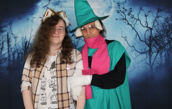 two students in costume