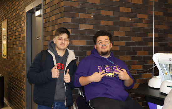 Two students enjoy the oxygen bar