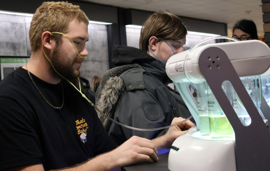 Two students enjoy the oxygen bar