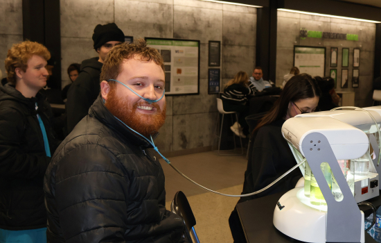 A student enjoys the oxygen bar