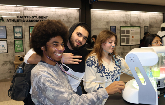 Three students enjoy the oxygen bar