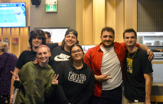 the board poses with local comedians chris gerassimou and steve appleyard