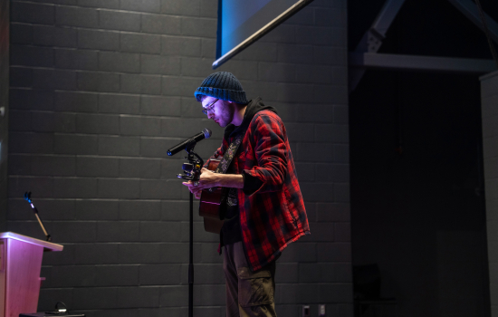 Saints Got Talent contestant performs with a guitar